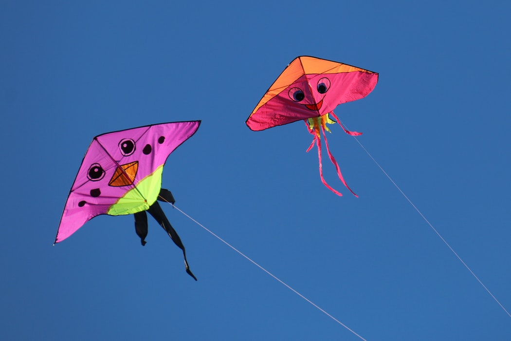 two kites in the sky.